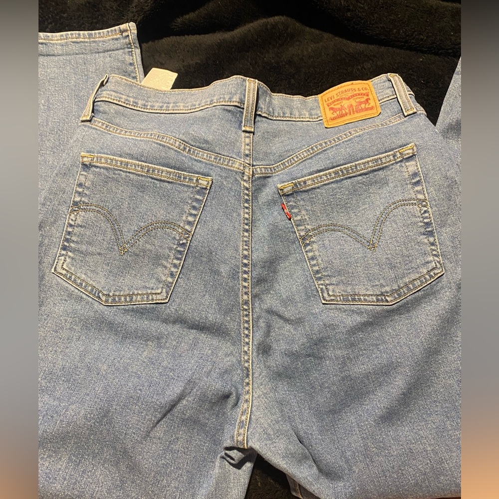 Levi taper jeans.